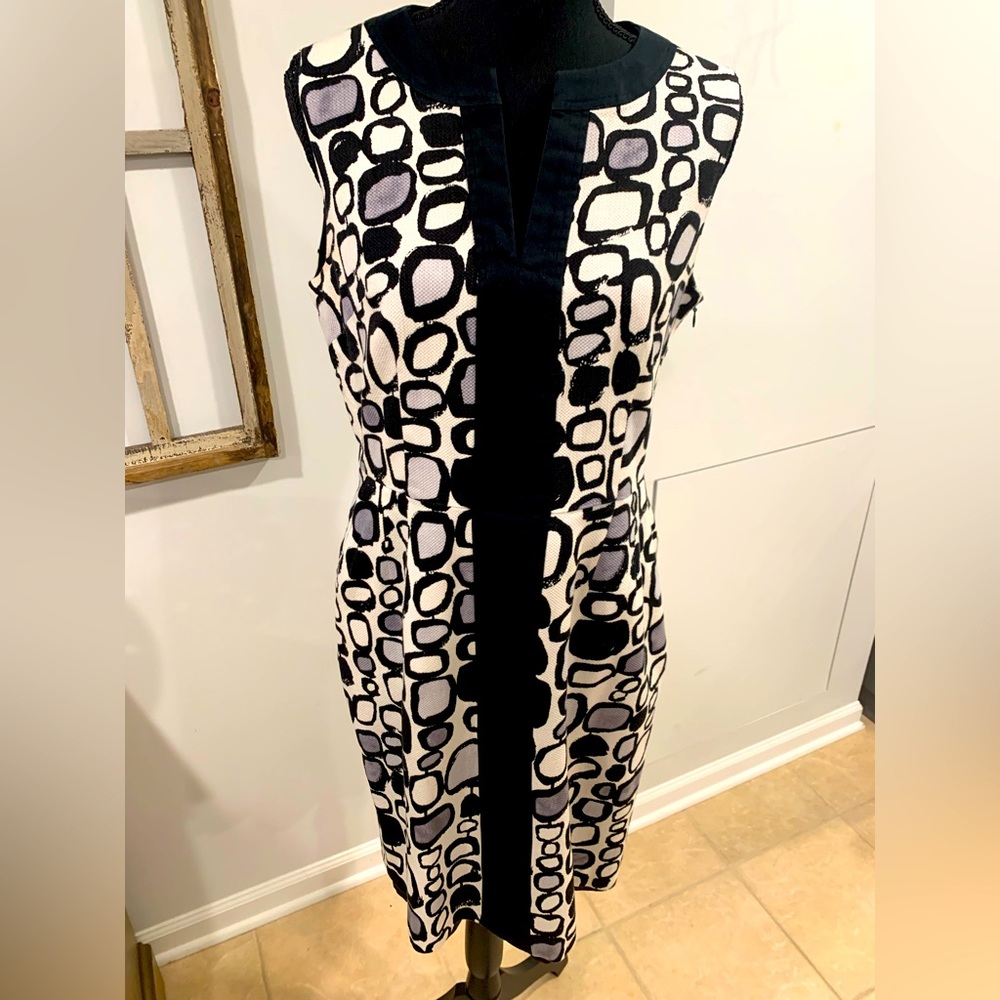 A fun print dress in black, grey, and white.